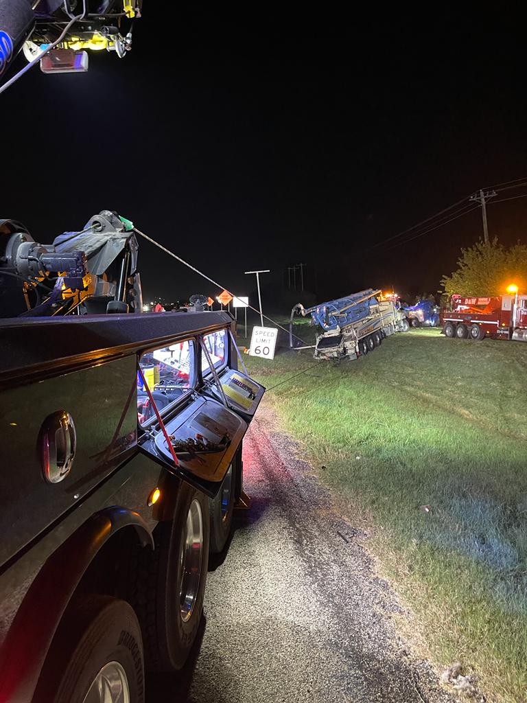 VIDEO: In the end, tow trucks pull down Potomac Mills sign